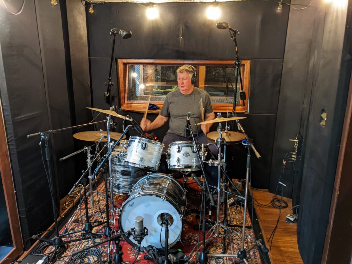 Dennis bedding the drums @ Ian Haug's Airlock Studio 2022